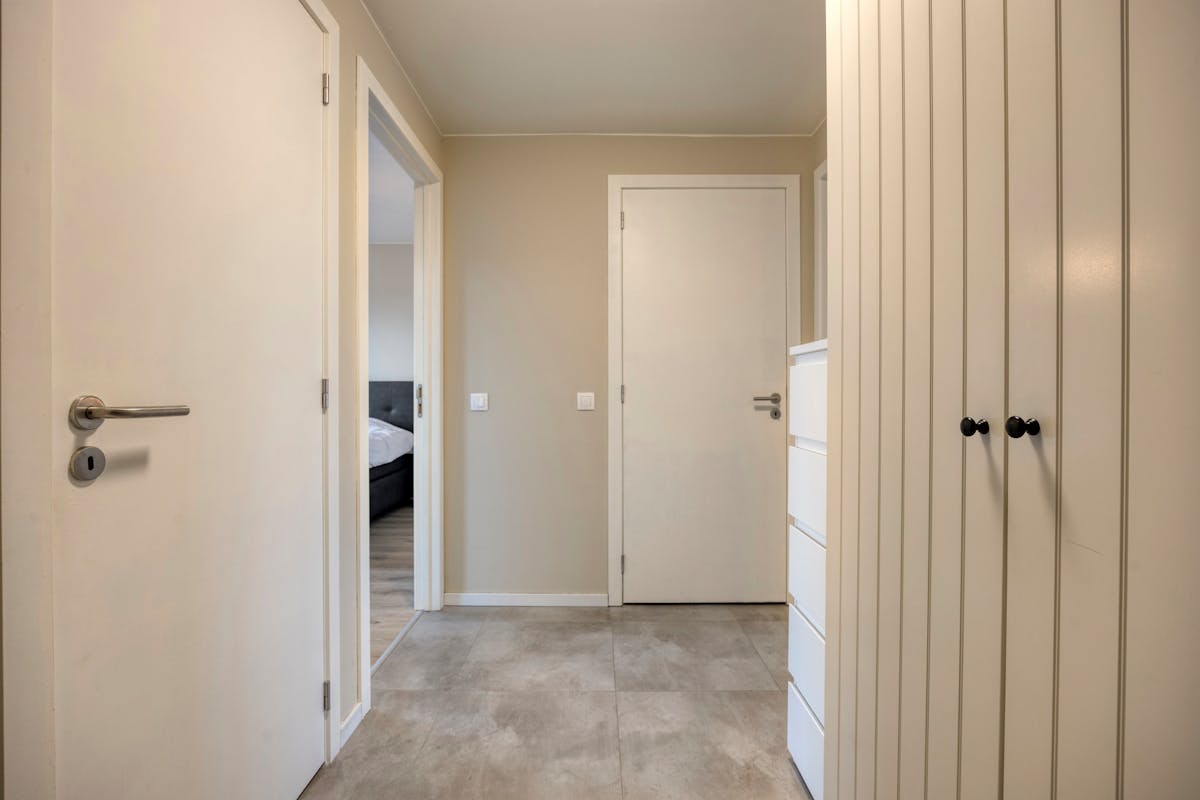Instapklaar 1-slaapkamerappartement met terras en parking in Residentie Parkview te Vilvoorde - foto 3
