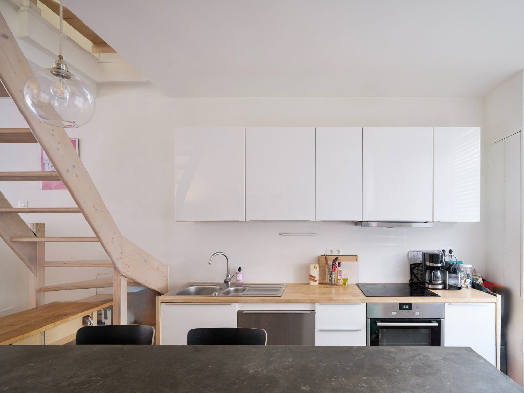 Lichtrijke stadswoning met 3 slaapkamers en buitenruimte, gelegen in een rustige straat op korte afstand van het centrum van Gent. - photo 4