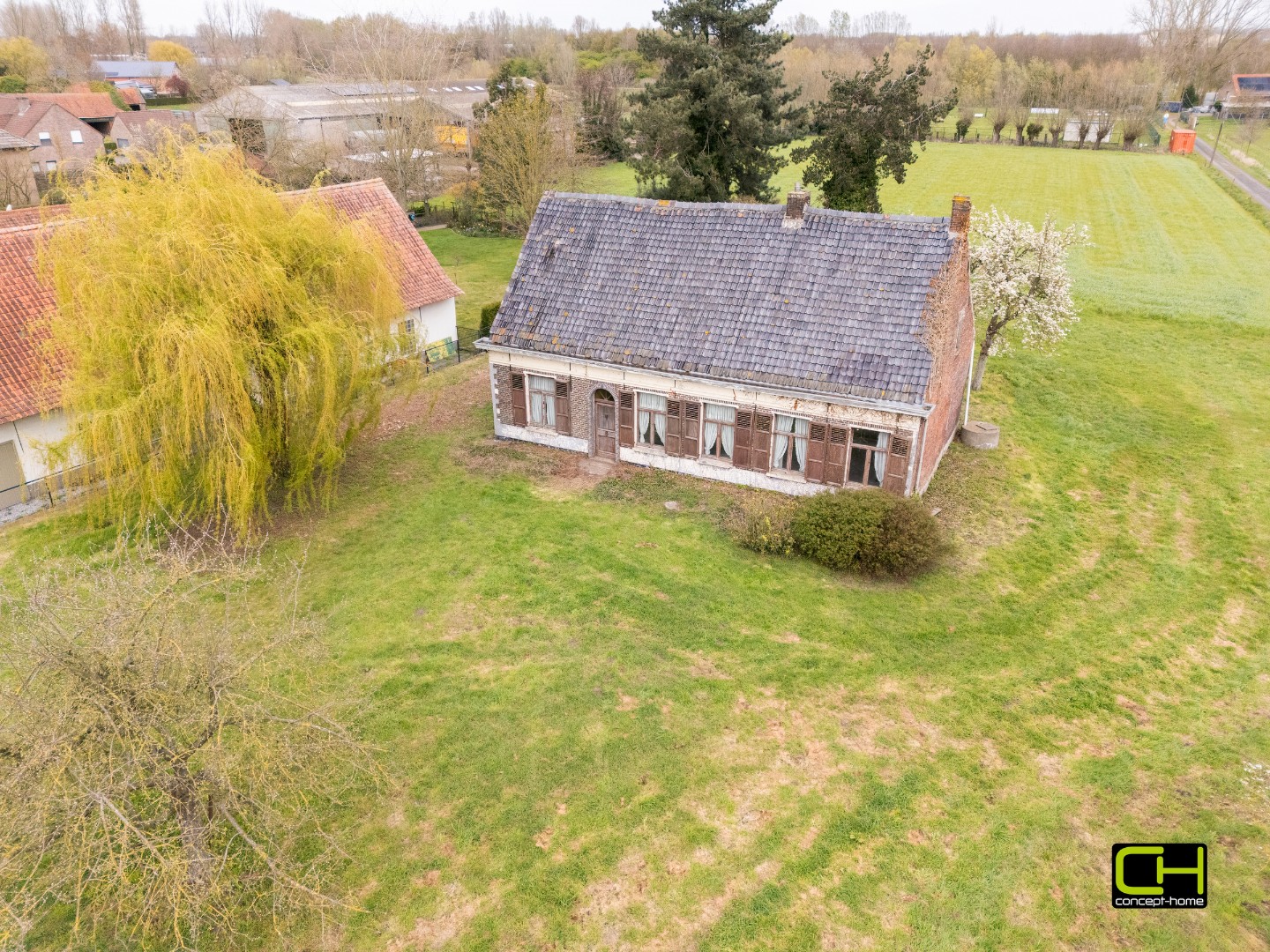 Karaktervolle hoeve met uitzonderlijk renovatiepotentieel op ruim perceel van 2.827 m² te Evergem - foto 2