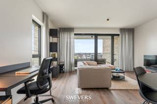 Voor meer info en foto’s, surf naar www.swevers.be– Ontdek dit stijlvolle en instapklare appartement van 72 m² op de zesde verdieping van de moderne...