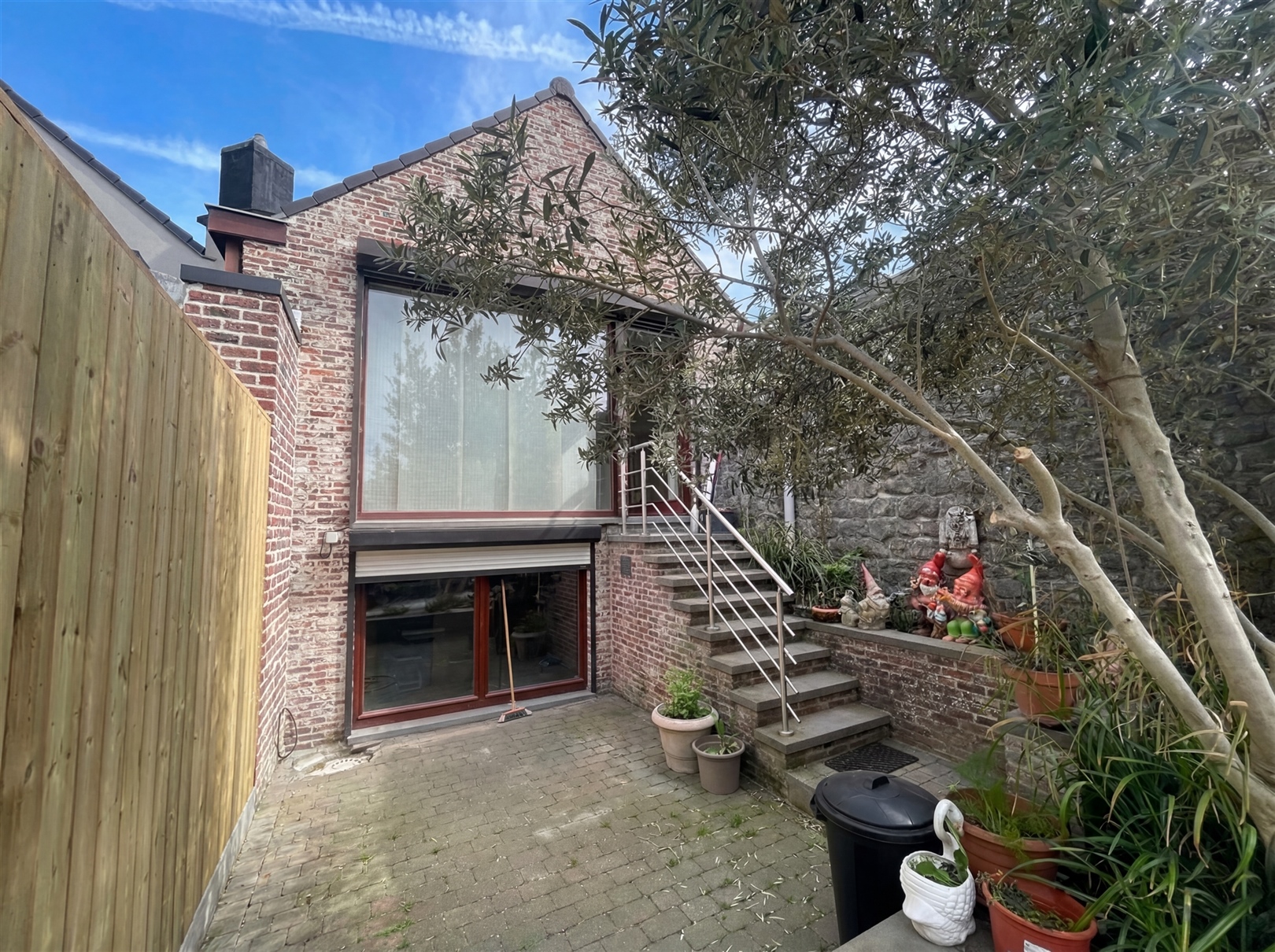 Ruime 3-gevelwoning met zuidgerichte tuin en terras! - foto 4