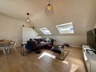 2-slaapkamerappartement aan de Grote Markt te Tienen, met onder andere een bewoonbare oppervlakte van 80 m², twee slaapkamers (één grote en...