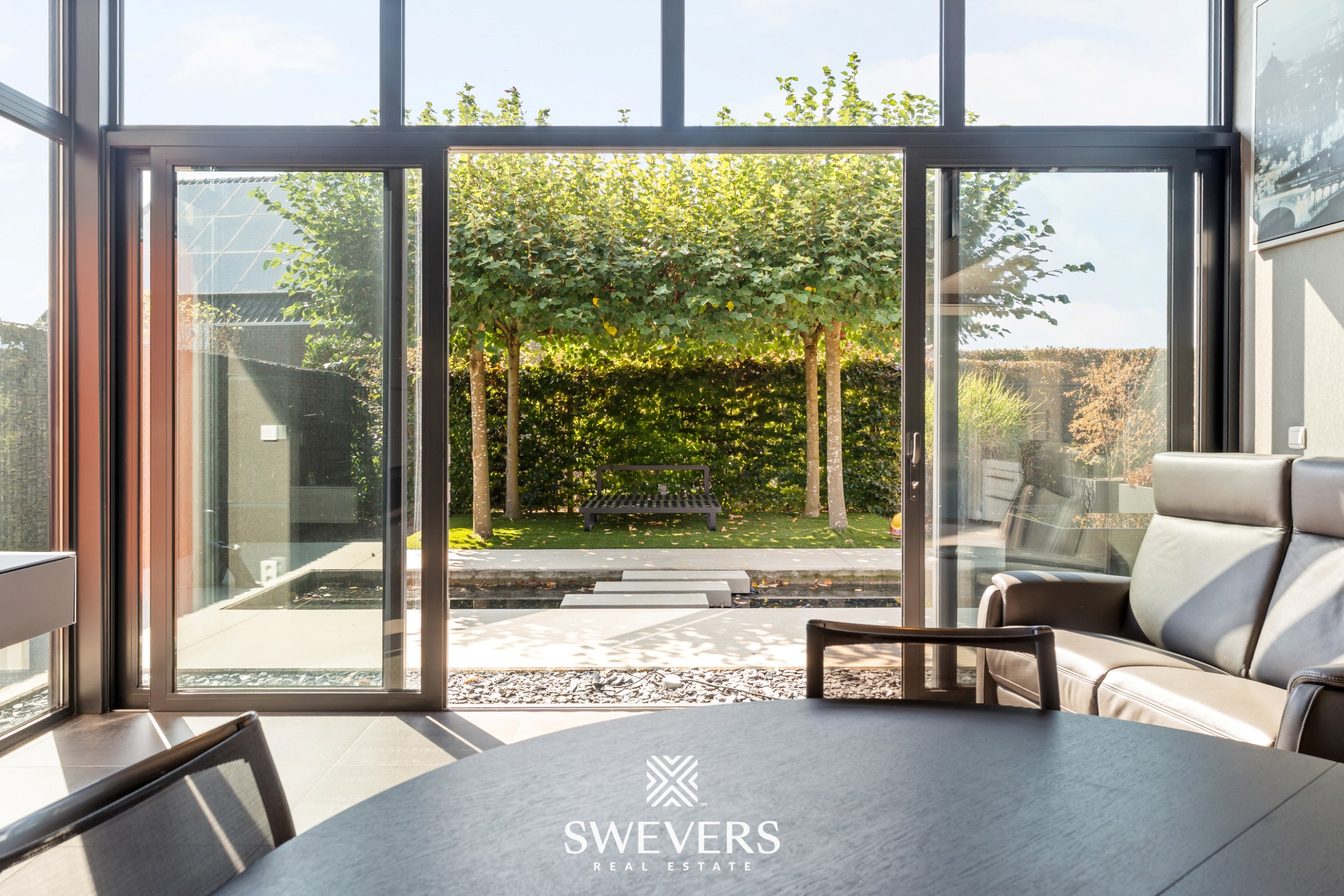 Instapklare woning met prachtig aangelegde tuin en overdekt terras - foto 4