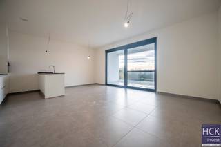 De liggingDit luxueus appartement is gelegen op de tweede verdieping van residentie "Kruishove", nabij het centrum van Kruishoutem en midden in een...