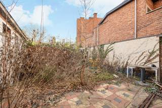 PROPRIÉTÉ DE RENDEMENT AVEC POTENTIEL DE RÉNOVATION AU CENTRE DE LIER...