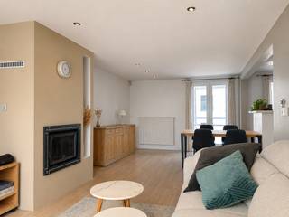This spacious family home is located in the heart of Westkapelle, a part of Knokke-Heist that has undergone a true transformation in recent years. The area is particularly popular with young families thanks to the continuous investments in the neighborhood, the renewal of the streetscape, and the strong improvement of the living environment. This makes this property not only a pleasant home, but also an interesting investment for the future.<br /><br />The biggest asset of this property is undoubtedly its exceptional size and practical layout. Upon entering, you are welcomed into a particularly spacious entrance hall that currently serves as a bicycle storage. Thanks to the many built-in closets, you can enjoy an abundance of storage space here.<br /><br />On the ground floor, there are already two full bedrooms, a separate office space, a bathroom with walk-in shower, and a practical storage room. In addition, the property has a cellar and a pleasant, sunny courtyard where it is wonderful to stay.<br /><br />The first floor is the heart of the home. Here you can enjoy a bright living room with a cozy wood stove and a fully equipped open kitchen. The large windows provide pleasant natural light throughout the day. Furthermore, on this floor, you will find a second bathroom with double sink and bathtub, a separate toilet, and a veranda that opens onto a particularly sunny terrace.<br /><br />On the second floor, there are two more spacious bedrooms, one of which is equipped with practical built-in closets.<br /><br />This property combines space, functionality, and an excellent location in a neighborhood with a promising future. Moreover, the electrical installation is compliant, which is an extra advantage for future owners.<br /><br />Layout:<br /><br />Ground floor:<br />- Very spacious entrance hall with bicycle storage,<br />- Office space,<br />- 2 bedrooms,<br />- Bathroom with walk-in shower,<br />- Storage room,<br />- Sunny courtyard,<br />- Cellar,<br /><br />First floor:<br />- Hall,<br />- Separate toilet,<br />- Bathroom with double sink and bathtub,<br />- Spacious living room with wood stove,<br />- Fully equipped open kitchen,<br />- Veranda,<br />- Sunny terrace,<br /><br />Second floor:<br />- 2 spacious bedrooms, one with built-in closets,<br /><br />Advantages:<br />- Spacious family home with 4 bedrooms,<br />- Lots of natural light,<br />- Sunny courtyard and terrace,<br />- Practical layout with office space,<br />- Lots of built-in closets,<br />- Compliant electrical inspection,<br />- Located in the rapidly improving Westkapelle,<br />- Interesting investment for the future,<br /><br />Looking for a spacious property with lots of potential in a neighborhood that is in full development? Contact us today for a visit and discover the many advantages of this property for yourself.