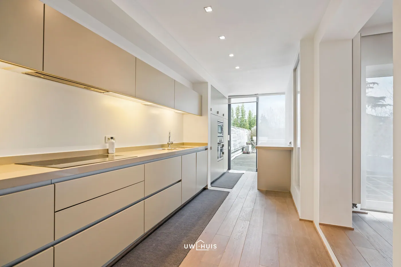 UNIEK HANDELSHUIS MET WINKELRUIMTE, STIJLVOLLE WOONST, POLYVALENTE RUIMTE EN TUIN MET ZWEMBAD IN ZWIJNDRECHT - foto 5