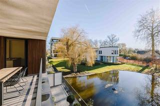 <p><span>SINT-NIKLAAS: Are you looking for a spacious apartment in a luxurious residence in Sint-Niklaas? Then definitely take a look at this beautiful apartment in Central Park.</span></p><p><span> </span></p><p><span>We list a few assets:</span></p><p><span>- Very nice finish</span></p><p><span>- Spacious living space (140m²)</span></p><p><span>- Located in a beautiful park garden with pond</span></p><p><span>- Quiet location but easily accessible</span></p><p><span>- Energy efficient</span></p><p><span> </span></p><p><span>The apartment is located on the top floor of block A in Central Park, a standing residence with beautiful park garden on the outskirts of the city.</span></p><p><span> </span></p><p><span>The layout is as follows:</span></p><p><span>Spacious entrance hall, guest toilet, checkroom, storage room, three bedrooms one of which has a balcony, spacious bathroom with spacious walk-in shower, bathtub, toilet and sink unit.</span></p><p><span>The living space is accessed through the beautiful wrought iron door and offers a sea of space and light. The kitchen is beautifully finished with built-in appliances and a composite worktop and backsplash.</span></p><p><span> </span></p><p><span>The adjacent, south-east facing and covered terrace is spacious and overlooks the beautiful park garden with pond. </span></p><p><span>In addition, this apartment has a spacious basement storage room and two parking spaces (one covered and one uncovered).</span></p><p><span>Thanks to the use of modern techniques such as a geothermal heat pump (with cooling), ventilation system D and smart control via a home automation system, this apartment offers all modern comfort! </span></p><p><span> </span></p><p><span>Be surprised by a site visit and contact soon for more info!</span></p><p><span>Guide price: 495 000 euros (+ purchase of 2 parking spaces)</span></p><p><span>EPC: label A</span></p>