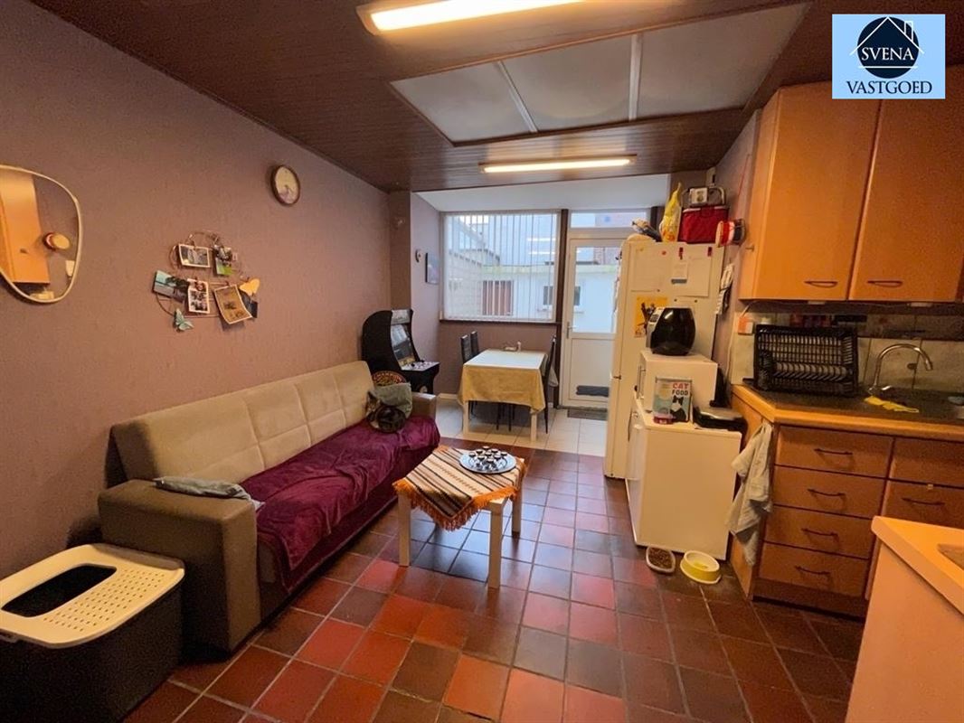 HANDELSZAAK + WOONST IN HET CENTRUM VAN GERAARDSBERGEN - foto 1