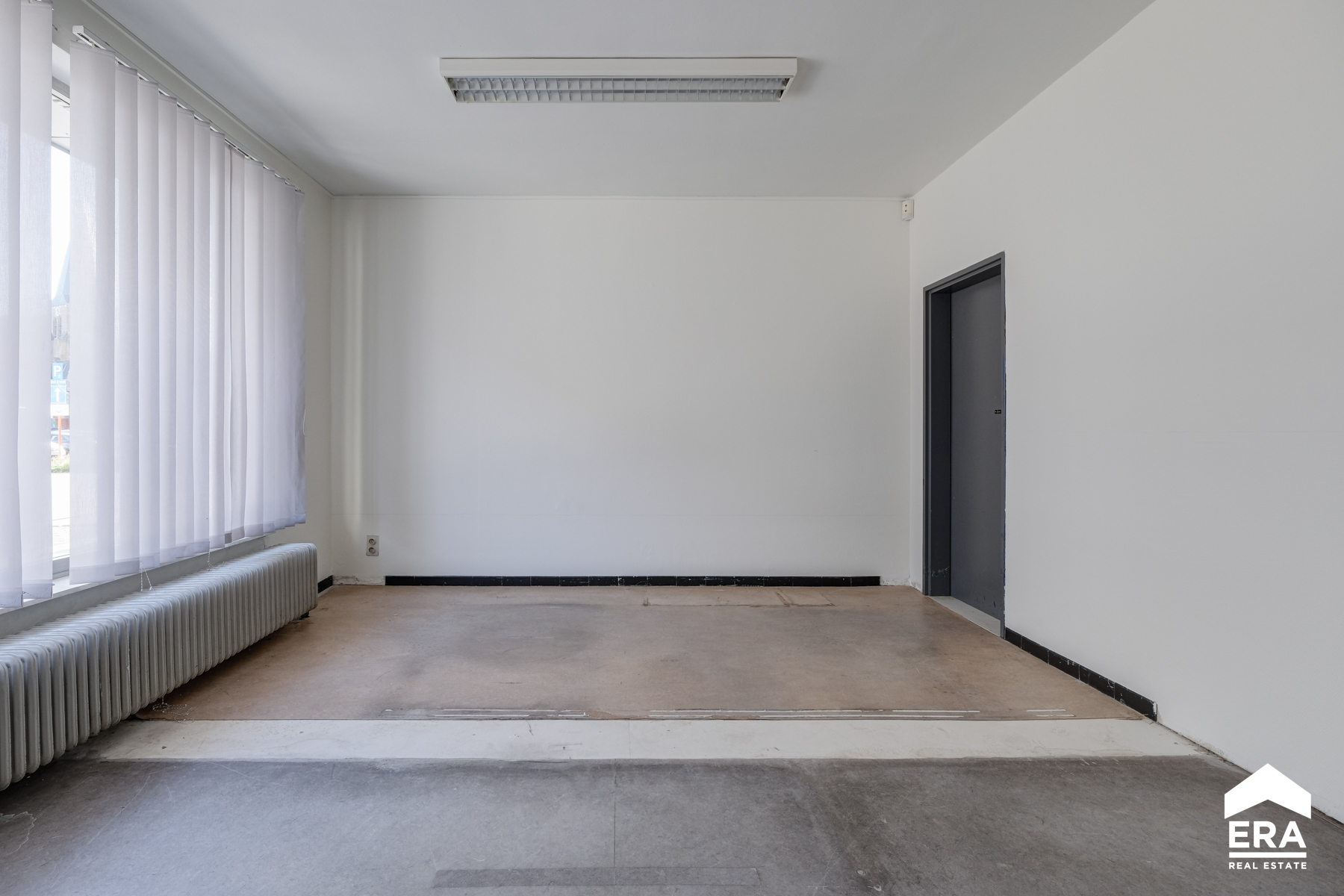 Gelijkvloers appartement in centrum Neerpelt - foto 3