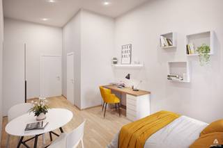 <br />Deze stijlvolle, volledig bemeubelde studentenkamer combineert modern comfort, kwalitatieve en duurzame materialen én beschikt over een eigen sanitaire voorziening.<br /><br />Als bewoner geniet u van uitzonderlijke gemeenschappelijke faciliteiten in het gebouw, waaronder studieruimtes, een fitnessruimte, gedeelde keukens en gezellige ontspanningsruimtes. <br /><br />De ligging is absoluut top: pal in het centrum van Kortrijk en op fietsafstand van alle hogescholen en de universiteit.<br /><br />Voordelen voor u als investeerder:<br />- Volledige ontzorging: Een professionele beheerpartner (Odalys) regelt alles voor u — van huurdersselectie en contracten tot onderhoud en administratie.<br />- 12 jaar huurgarantie: U bent verzekerd van vaste inkomsten, zonder risico op leegstand.<br />- Geen bijkomende kosten: Geen zorgen over onroerende voorheffing, verzekeringen, gemeenschappelijke kosten of onderhoud.<br /><br />Keuze uit afwerking: <br />Beschikbaar in de types Basic, Premium en Premium+.<br /><br />Prijzen vanaf € 134.500 (exclusief kosten).<br /><br />Wilt u meer weten over deze unieke kans om zorgeloos te investeren in een hoogwaardige studentenkamer in Kortrijk? <br /><br />Neem contact op via 056 22 55 66.