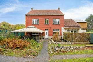 OPPORTUNE WONING TE LUBBEEK: THUISKOMEN IN LANDELIJKE CHARME, OMRINGD DOOR NATUURTussen de zacht glooiende landschappen van Lubbeek, en op het einde...