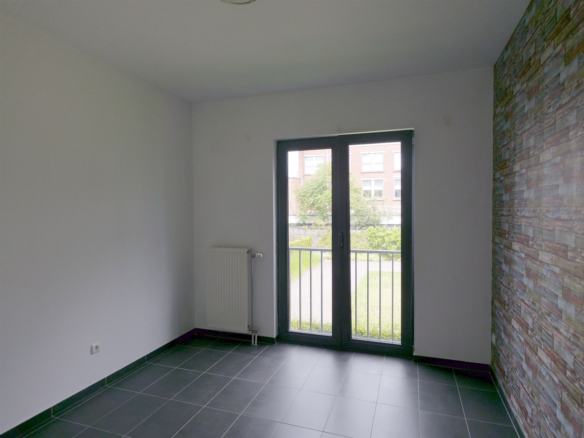 Mooi appartement met terras en autostaanplaats - foto 5