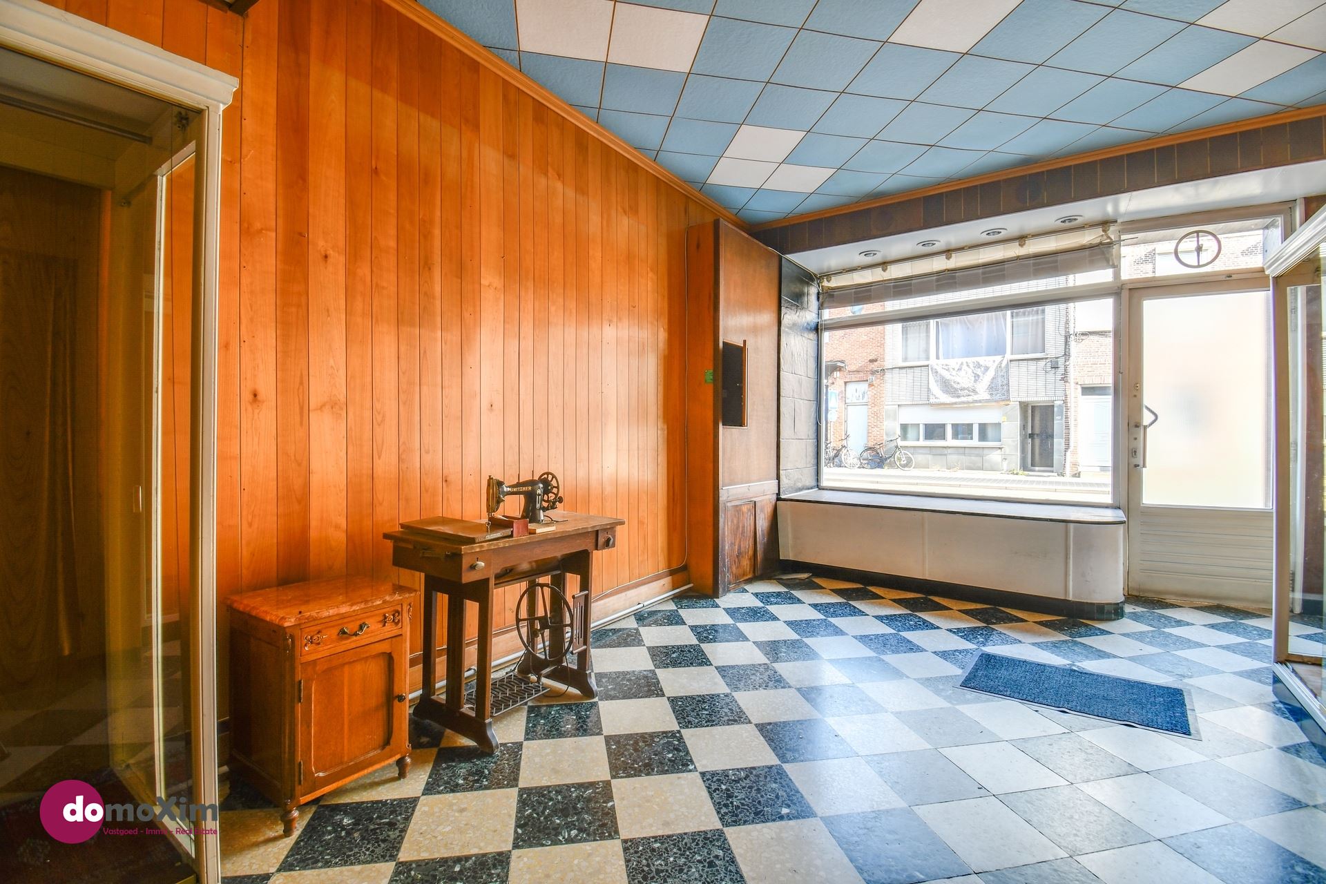 Te renoveren stadswoning met zuid-gerichte tuin en garage - foto 4
