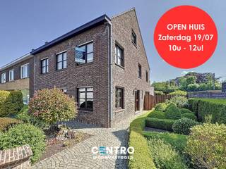 Degelijke en PERFECT ONDERHOUDEN woning met 3 s à 4 lpks, dressing, 2 garages, UITWEG achteraan en tuin met 2 LEUKE ZONNETERRASSEN te...