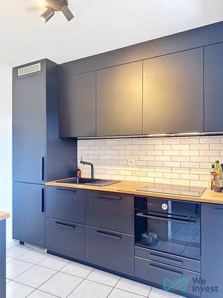 ID7713050: Charmant,vernieuwd appartement (112m²) met lift, 2 slaapkamers, zonneterras en garage met aparte berging in hartje Heppen...