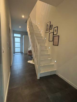 ‼️🏡 TE KOOP ‼️<br />Moderne instapklare woning met gescheiden professionele ruimte vlakbij hartje van bazel!<br />Richtprijs : €469 000<br /><br /><br /><br />🔑 Instapklaar !<br />✨ Moderne woning<br />Een stijlvolle, recent afgewerkte woning met tuin, alle hedendaagse comfort + een gescheiden ruimte voor professionelen met aparte ingang (momenteel schoonheidssalon) of garage.<br /><br />•Gelijkvloers<br />In het privé gedeelte komt u binnen in een grote inkomhal met een grote vestiaire + mogelijkheid tot extra gastentoilet.<br /><br />🛁Ruime badkamer met inloopdouche, toilet en lavabo.<br /><br /><br />🛋️ Open living met ingebouwde elektrische openhaard.( incl verwarmingsfunctie) die kindvriendelijk is aangezien het glas niet warm wordt.<br /><br />🧑🍳Ruime open keuken met kookeiland, oven en microgolf ingebouwd incl frigo en diepvries.<br /><br />•1ste verdiep<br />Ruime kamer ( optioneel 2 kamers door eenvoudig ingreep)<br /><br />Ruime badkamer met douche, bad en dubbele lavabo<br /><br />Ruime Dressing(of slaapkamer)<br /><br /><br />•2de verdiep<br /><br />Master bedroom met aangelegd dakterras<br /><br />🛏️ 3 of 4 slaapkamers<br />2 ruime badkamers met kwalitatieve afwerking<br />•Totale woonoppervlakte: 201,88 m²<br />• oppervlakte perceel 255,57 m²<br />• tuin 160 m²<br /><br /><br />🌿 Buitenruimte<br />Zonnig terras met tuin en ruim tuinhuis 12,6m². achter het tuinhuis nog extra overdekte opbergruimte.<br /><br />🔋Duurzaamheid<br />Zonnepanelen<br />Airco op elk verdiep *samsung*<br />Elektrische Rolluiken op zonne energie( bedienbaar met app of schakelaar)<br /><br /><br />📍Toplocatie<br /><br />Centraal gelegen tussen Antwerpen en Sint-Niklaas<br />Vlotte verbinding naar de E17 /N16<br />Op wandel afstand:<br />School (20m) rechtover over de woning<br />Winkels (50m)<br />bakker (110m)<br />Frituur (30m)<br />restaurants (160m)<br />polders van Kruibeke (1km)<br />bos (300m)<br />Openbaar vervoer (190m)<br />