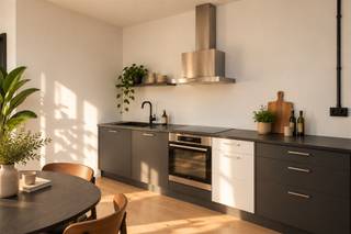 <p><b>Welcome to this excellently renovated apartment in the heart of Antwerp</b></p><p>This attractive 83m² apartment combines authentic charm with modern comfort. The property is located in a historic building with characteristic brick walls that you will find throughout the interior, which gives this home a unique and warm atmosphere.</p><p><b>Layout and rooms:</b> The apartment features two spacious bedrooms, each with large windows that let in plenty of natural light. The bedrooms are finished with warm woodwork and offer plenty of storage space thanks to the convenient built-in closets. The living room is an open, bright space with a pleasant layout, ideal for both relaxation and entertaiment.</p><p><b>Kitchen:</b> The modernized kitchen features a green kitchenette with all the necessary appliances, including a modern range hood. This spacious cooking element integrates perfectly into the open living space.</p><p><b>Bathroom:</b> The pleasant bathroom has been completely updated with a black shower enclosure, sink and modern fixtures. An angled radiator provides comfort and style.</p><p><b>Details:</b> The apartment features a practical hallway closet for additional storage space. The finish with parquet floors, stylish curtains and modern accessories make this property immediately employable and fully ready for occupancy.</p><p><b>Location:</b> Located in lively Antwerp, close to stores, restaurants and public transport. An ideal choice for those looking for a stylish and functional apartment in a vibrant area.</p>