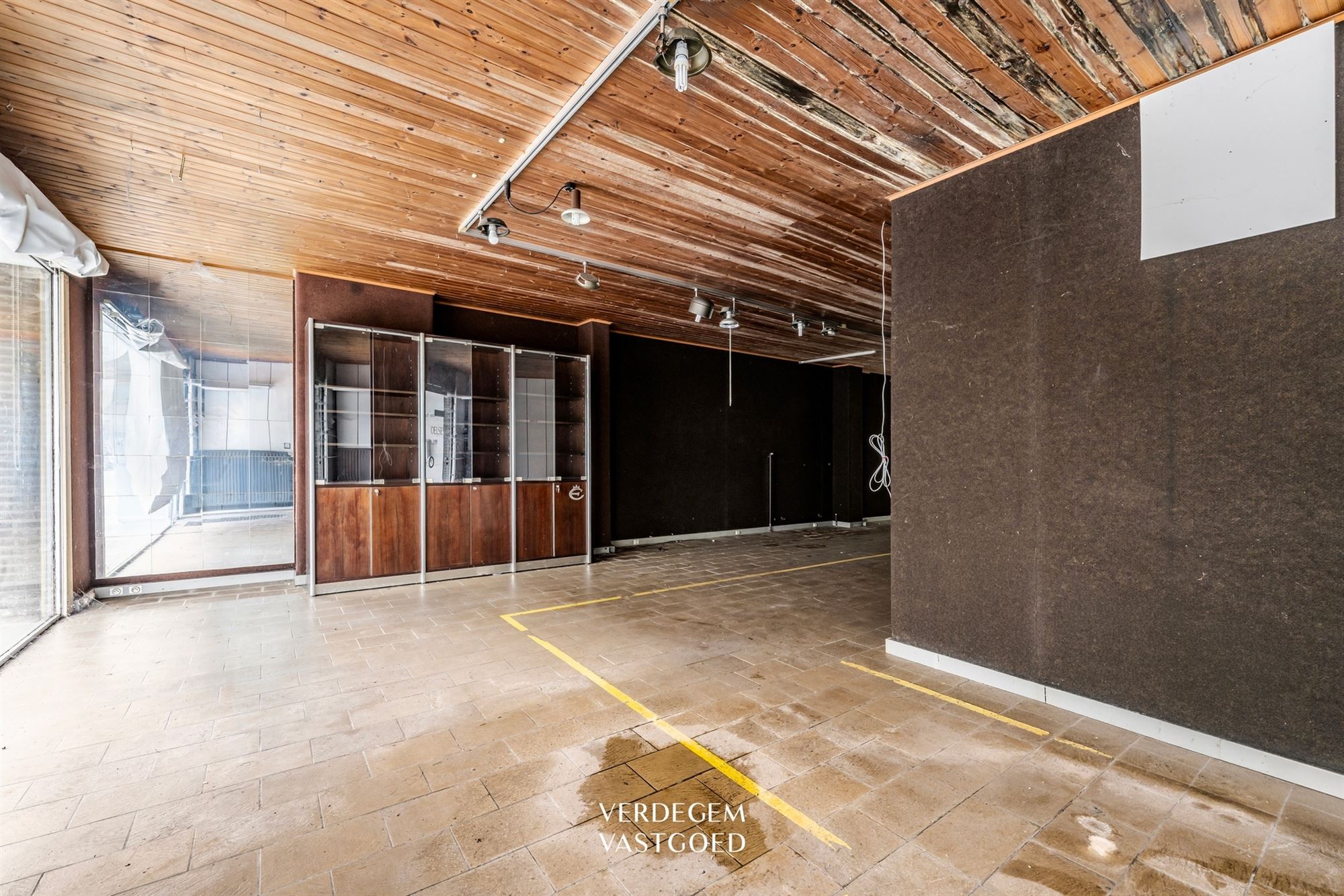 Renovatieproject: centraal gelegen handelspand met woonst en tuin - foto 5