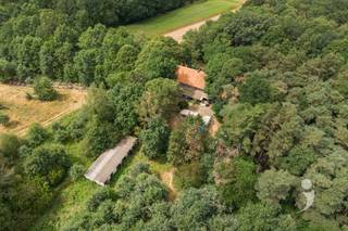 <p><span>Unique renovation project on an exceptional estate of over 1 hectare. </span></p><p><span> </span></p><p><span>Are you looking for a home with character, space, and a unique location? Then this property offers a rare opportunity. </span></p><p><span> </span></p><p><span>This spacious home has a </span><span>living area of 256 m²</span><span> and needs to be </span><span>fully renovated</span><span>. However, due to the practical layout, it forms the ideal basis for a beautiful family home, with the possibility to </span><span>create up to 5 full-sized bedrooms</span><span>. </span></p><p><span> </span></p><p><span>The absolute asset of this property is undoubtedly the </span><span>expansive estate of over 1 hectare</span><span>. Surrounded by greenery and forests, you enjoy unparalleled peace and an exceptional sense of freedom. </span><span>No direct neighbors</span><span>, complete privacy, and an idyllic setting make this location a true rarity. </span></p><p><span> </span></p><p><span>Whether you dream of an exclusive family home, a country residence, or a renovation project in a prime location: this property offers enormous potential. </span></p><p><span> </span></p><p><span>Interested? Contact us today for a visit at 016 15 31 15 or info@immolivit.be and discover the potential of this spacious home for yourself.</span><span> </span></p><p><span> </span></p>