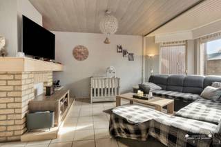 <p><span>This well-maintained and spacious family home, with no less than 228 m² of living space, is situated on a lot of 5 are 25 centiare, near the center of Zonhoven. Thanks to its convenient location, spacious layout, and various renovations, this home offers many advantages.</span></p><p><span> </span></p><p><span>The home was built in 1953 and has been modernized in key areas over the years. For example, in 2015, the roof was replaced and fitted with 16 cm of insulation, new Velux skylights were installed, and the gutters were replaced with zinc ones. Furthermore, the home was equipped with a new Vaillant gas boiler in 2019, cavity wall insulation and 21 solar panels with an inverter in 2022, and, most recently, electric roller shutters in 2024.</span></p><p><span> </span></p><p><span>These investments have helped the home achieve an EPC rating of B, making it not only spacious and comfortable but also highly energy-efficient.</span></p><p><span> </span></p><p><span>Upon entering, you are welcomed into a pleasant entryway. From here, you reach the spacious living area, which enjoys a pleasant flow of natural light thanks to the large windows. The cozy sitting area serves as a lovely central gathering space for the whole family.</span></p><p><span> </span></p><p><span>The ground floor also features a kitchen, a practical storage/laundry room, a separate toilet, and a spacious in-home garage. This garage not only accommodates a car but also provides additional storage space.</span></p><p><span> </span></p><p><span>The first floor features three bedrooms and a bathroom. The bathroom provides access to the spacious attic. This space offers interesting possibilities for expansion and, with the necessary renovations, can be converted into one or two additional bedrooms, a hobby room, an office, or a multipurpose space.</span></p><p><span> </span></p><p><span>This home also has a lot to offer outdoors. The spacious and fully fenced yard is ideal for families, children, and pets and offers the necessary privacy. In addition, parking is available alongside the house.</span></p><p><span> </span></p><p><span>Numerous renovations and energy-efficient features</span></p><p><span>Living area: 228 m² according to the EPC</span></p><p><span>Lot size: 5 are 25 centiare</span></p><p><span>Year built: 1953</span></p><p><span>Renovations: 2015  2019  2022</span></p><p><span>EPC rating: B</span></p><p><span>New roof</span></p><p><span>16 cm of roof insulation</span></p><p><span>New Velux skylights</span></p><p><span>Zinc gutters (2015)</span></p><p><span>Cavity wall insulation</span></p><p><span>New Vaillant gas boiler (2019)</span></p><p><span>21 solar panels + inverter (2022)</span></p><p><span>Electric roller shutters (2024)</span></p><p><span>3 bedrooms</span></p><p><span>Spacious attic with potential for 1 to 2 additional bedrooms</span></p><p><span>Spacious in-house garage</span></p><p><span>Parking available next to the house</span></p><p><span>Fully fenced yard</span></p><p><span>Asbestos-safe</span></p><p><span>Electrical system up to code</span></p><p><span>Ideal location</span></p><p><span> </span></p><p><span>The home is located near the center of Zonhoven, making shops, schools, and other daily amenities easily accessible. The location is also attractive for commuters thanks to the quick connection to the E314, Hasselt, and Houthalen.</span></p><p><span> </span></p><p><span>EPC: B</span></p><p><span>EPC unique code: 20260818-0003932016-RES-1</span></p><p><span> </span></p><p><span>A spacious and well-maintained family home with 228 m² of living space, a beautiful garden, an in-home garage, three bedrooms, and plenty of potential in the attic. Thanks to the renovations and energy-efficiency upgrades already completed, this home is ready for the future.</span></p><p><span> </span></p><p><span>Interested? For more information or to schedule a viewing, please don’t hesitate to contact us at 011 199 991 or info@janssenenjanssen.be.</span></p>