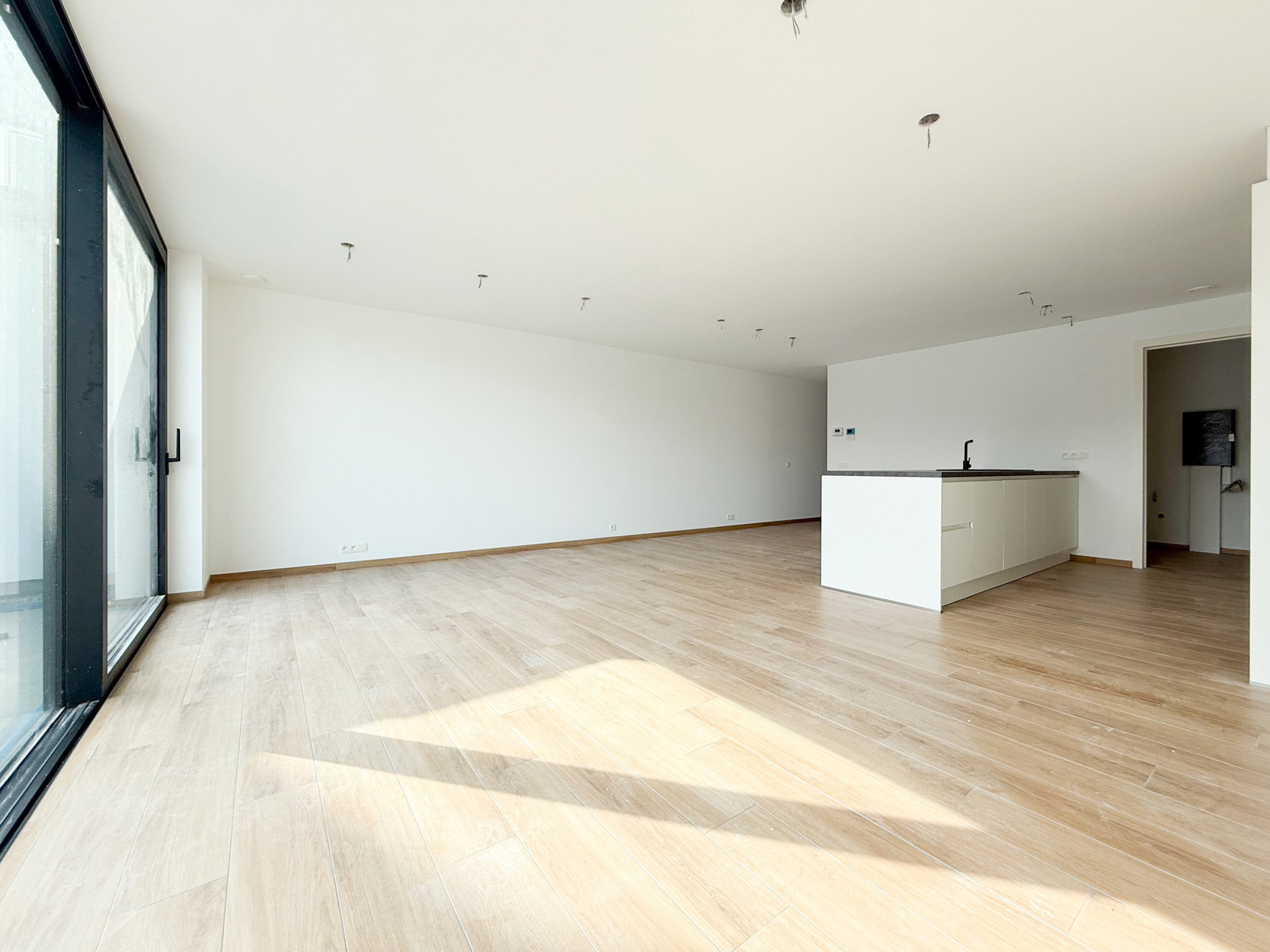 Nieuwbouwappartement met ruim terras en garagebox - foto 4