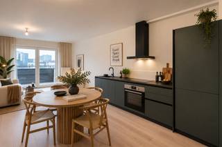 <p><b>Elegant Modern Apartment in Heart of Antwerp</b></p><p>Discover this stunning 63m² apartment located in vibrant Antwerp, offering contemporary comfort and style. This well-designed residential space spans 69m² total and features smart utilization of every square meter, making it an ideal choice for discerning buyers seeking modern urban living.</p><p><b>Key Features:</b></p><p>The property boasts <b>1 spacious bedroom</b> with beautiful views overlooking the lively Antwerp cityscape, including picturesque sightlines toward the historic city center. Large windows flood the space with natural light, creating an inviting and bright atmosphere.</p><p>The <b>open-plan kitchen and living area</b> showcases contemporary design with a sleek built-in kitchen featuring modern appliances, including a gas cooktop and integrated oven. The warm wooden flooring throughout creates a cohesive, welcoming aesthetic that flows seamlessly from the living spaces into the bedroom areas.</p><p><b>Bathroom & Facilities:</b></p><p>A <b>modern, well-appointed bathroom</b> features distinctive cork-textured walls with contemporary fixtures, including a rainfall shower and elegant basin. The bathroom design combines functionality with sophisticated style.</p><p><b>Building Amenities:</b></p><p>The building provides <b>secure, professional facilities</b> including accessible stairwells with modern white railings and emergency safety equipment, ensuring resident comfort and security.</p><p><b>Location & Views:</b></p><p>Positioned on an upper floor, this apartment offers <b>exceptional panoramic views</b> of Antwerp's vibrant cultural district, with direct sightlines to the famous Plaça square and surrounding architectural landmarks. The location provides excellent access to shops, restaurants, and cultural attractions.</p><p>This contemporary apartment represents an outstanding opportunity for those seeking stylish, modern living in one of Belgium's most dynamic cities.</p>
