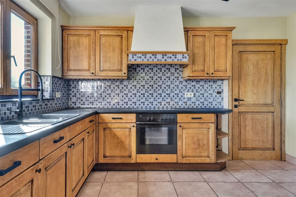 Woning met 22 stallen, binnen- en buitenpiste op 1,6ha in Sint-Truiden - foto 3