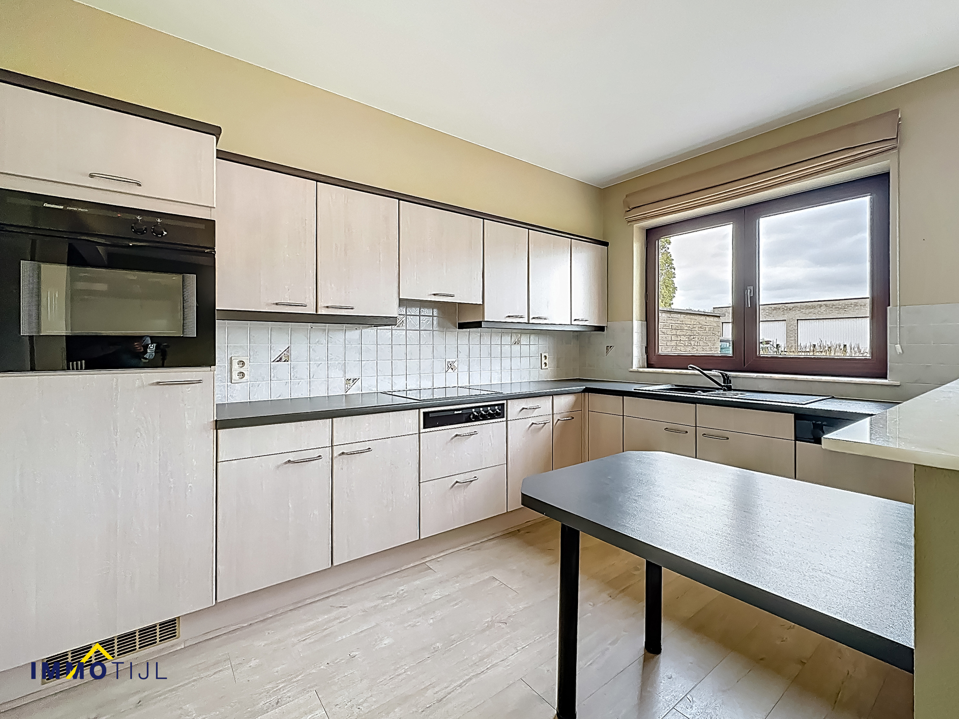 Ruim gelijkvloers appartement met privétuin en staanplaats! - foto 3