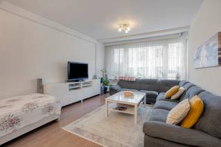 LOCATION<br /><br />Discover this ready-to-move-in flat on Henri Choméstraat, located in Schaarbeek. The flat is conveniently located on the outskirts of Brussels. The lively city centre is easily accessible by bicycle or public transport. All necessary amenities, such as schools, shops and public transport, are within walking distance.<br /><br />There is plenty of parking space available in the nearby streets, and the flat has excellent connections to major access roads such as the E40, R21 and N3. Whether you travel by car, bicycle or public transport, this flat is easy to reach.<br /><br />Experience the greenery in the surrounding area! The flat is within walking distance of the beautiful Josafatpark, where you can enjoy greenery and relaxation in a natural setting. Excellent mobiscore of 9.4/10!<br /><br />LAYOUT<br /><br />This ready-to-move-in 89 m² flat combines living comfort with an excellent location. Upon entering, you are welcomed into a spacious living area with large windows. The fitted kitchen, adjacent to the living area, is perfect for those who enjoy cooking and dining together.<br /><br />The flat also has two comfortable bedrooms, one of which has a private balcony. The large room offers extra storage space. The bathroom with shower and separate toilet complete the picture.<br /><br />Thanks to the renovated communal heating system (2023), double glazing and a favourable EPC label C+, you can enjoy an energy-efficient and carefree living experience here.<br /><br />ADVANTAGES<br /><br />- Ready-to-move-in flat<br />- Located in a prime location with easy access to the city centre and access roads<br />- EPC C+<br /><br />Contact Bram today on +32 471 76 90 50 to schedule an appointment.