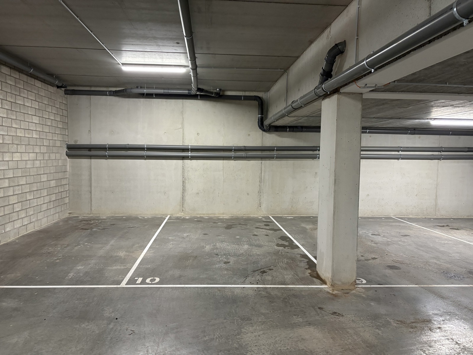 Ondergrondse staanplaats in het centrum van Wommelgem. - foto 2