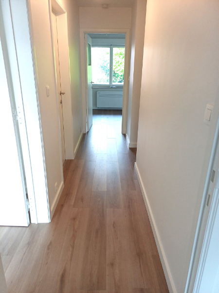 Volledig gerenoveerd en energiezuinig appartement met 2 slaapkamers, balkon en garage - foto 4