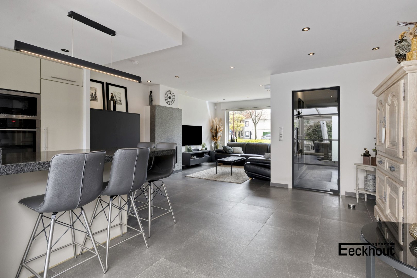 Instapklare woning met handelsruimte en met zonnige tuin! - foto 4