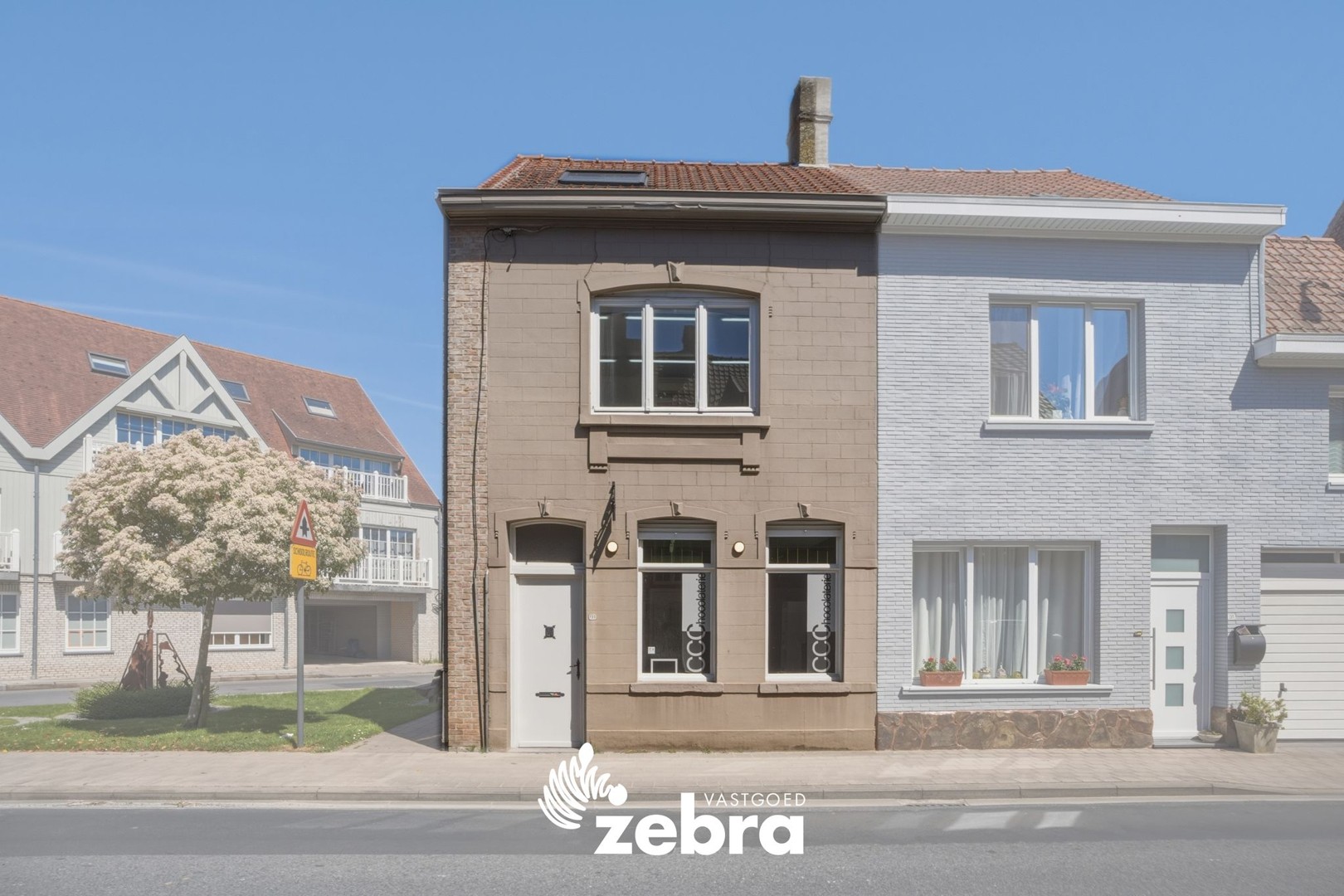 Charmant handelspand met bijgebouw en tal van mogelijkheden in hartje van Desselgem! - foto 1