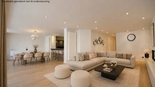 Topaanbieding – Uitzonderlijk ruim appartement gelegen in een stijlvolle residentie<br />Ontdek dit uitzonderlijk appartement, gelegen in een elegante residentie. Dit pand onderscheidt zich door zijn royale volumes, uitstekende ligging, hoogwaardige afwerking en een indrukwekkende gevelbreedte van ca. 10 meter. Bovendien geniet u van meerdere zonnige terrasjes, wat het wooncomfort compleet maakt.<br />Indeling:<br />Ruime inkomhal met gastentoilet en tal van ingemaakte kasten. De bijzonder ruime leefruimte afgewerkt met een massieve eiken parketvloer baadt in het licht en omvat een sfeervol salon met maatkasten en een gezellige gashaard. De open, volledig geïnstalleerde keuken is voorzien van alle hedendaags comfort, waaronder een Quooker-kraan, wijnfrigo, combi-oven en een Falcon fornuis. Vooraan bevinden zich twee aangename terrasjes.<br />Verder is er een aparte berging/wasplaats.<br />De master suite beschikt over ingemaakte kasten, een aparte dressing en een stijlvolle badkamer. De slaapkamer geeft rechtstreeks uit op het terras achteraan.<br />Tweede volwaardige slaapkamer. Aparte douchekamer.<br />De derde slaapkamer is bijzonder praktisch ingericht met een uitklapbaar stapelbed én een uitklapbaar dubbel bed, en beschikt over een aanpalende badkamer. Beide kamers geven uit op het tweede terras achteraan.<br />Dit appartement is een absolute aanrader dankzij de kwalitatieve afwerking, de uitzonderlijke ruimtes en het doordachte ontwerp.<br />Inclusief twee privatieve kelders in de residentie en fietshaken.