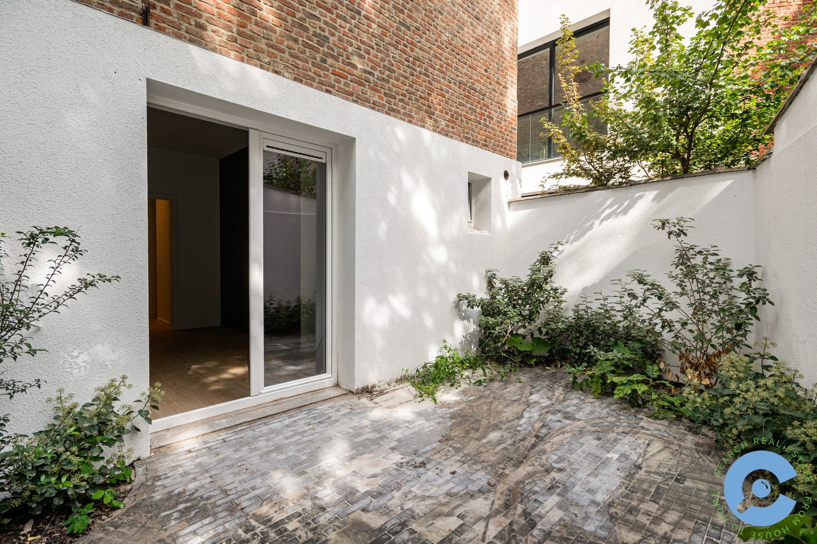 Gerenoveerd gelijkvloers appartement met terras! - foto 1