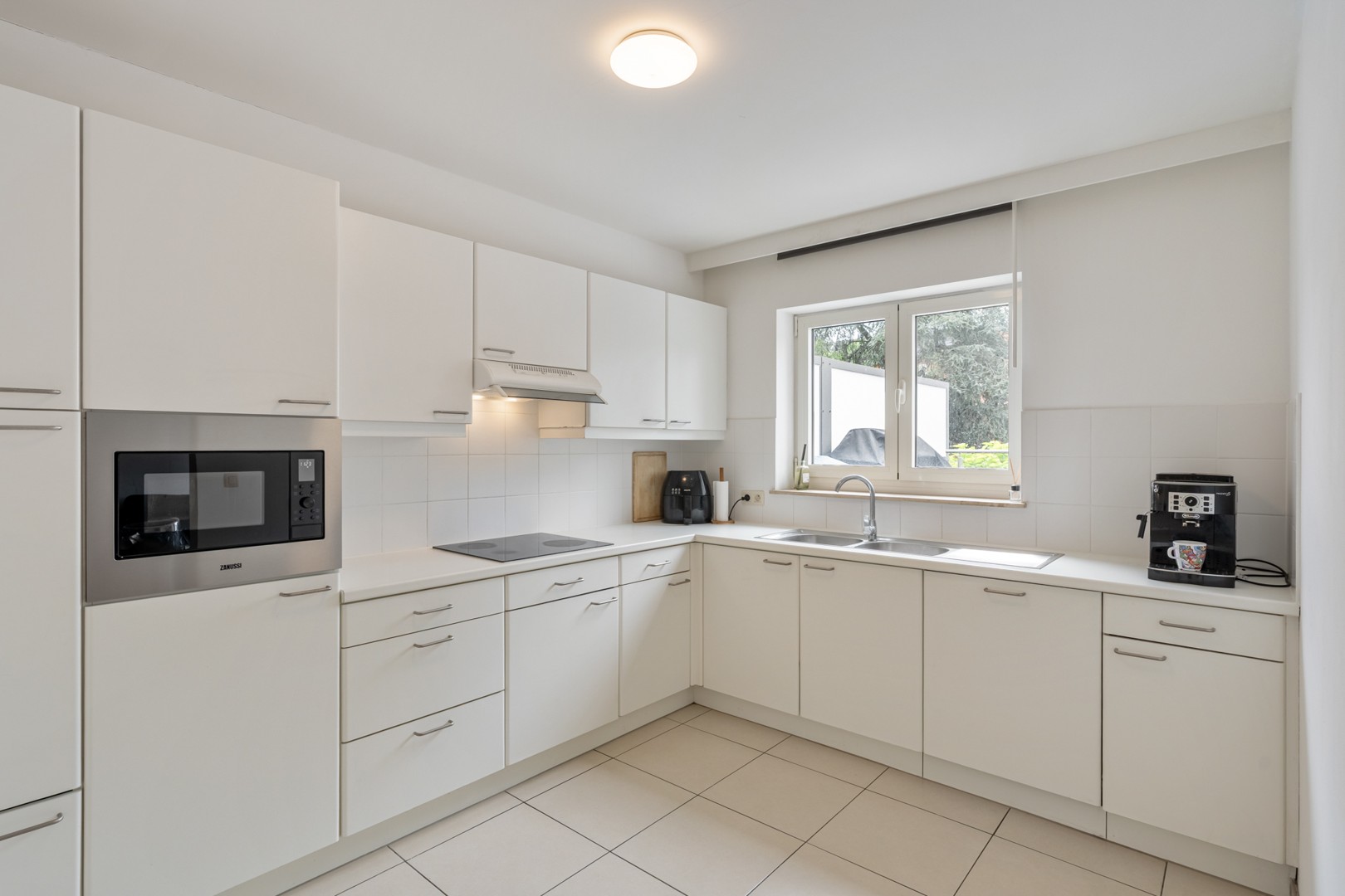 Te koop: Lichtrijk en goed onderhouden 2-slaapkamerappartement met ruim terras en garage in centrum Leopoldsburg - foto 5