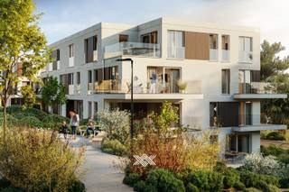 Dit gelijkvloers tweeslaapkamer appartement van 85,6 m² beschikt over een inkomhal, een lichtrijke leef- en eetruime met open keuken en keukeneiland, een afzonderlijk toilet, een badkamer uitgerust met een dubbele wastafel en een douche, twee slaapkamers en een praktische berging. Daarnaast heeft het appartement ook een oostelijk georiënteerd terras van 18,7 m² en een tuin van 8,8 m².<br /><br />Het appartement maakt deel uit van het nieuwbouwproject 'Kruishove' en is gelegen op een boogscheut van het centrum van Kruisem. Voor de architectuur stelden de ontwikkelaars het gerenommeerde architectenbureau Bontinck, onder leiding van John Bontinck, aan. De nadruk werd gelegd op het bekomen van één architecturaal geheel, waarbij er werd gekozen voor riante in- en uitpandige terrassen en dakterrassen voor een speelse variatie in de gevel. Een ontwerp dat bovendien zorgt voor de nodige schaduw op de zuid-gerichte raamvlakken en voldoende kwalitatieve privatieve buitenruimtes. Kruishove onderscheidt zich naast haar centrale ligging en hoogstaande architectuur, door haar erg lage energieverbruik en duurzaam karakter, volledig vrij van fossiele brandstoffen. Zo voorziet men een combinatie van vloerverwarming met geothermische warmtepompen, fotovoltaïsche panelen en een sterke akoestische en thermische isolatie. <br /><br />Verlaagd BTW-tarief van 6% mogelijk op de volledige constructiewaarde, nu ook voor investeerders mits min. 15 jaar verhuur.<br /><br />Benieuwd? guillian@landbergh.be of 09 278 78 79.