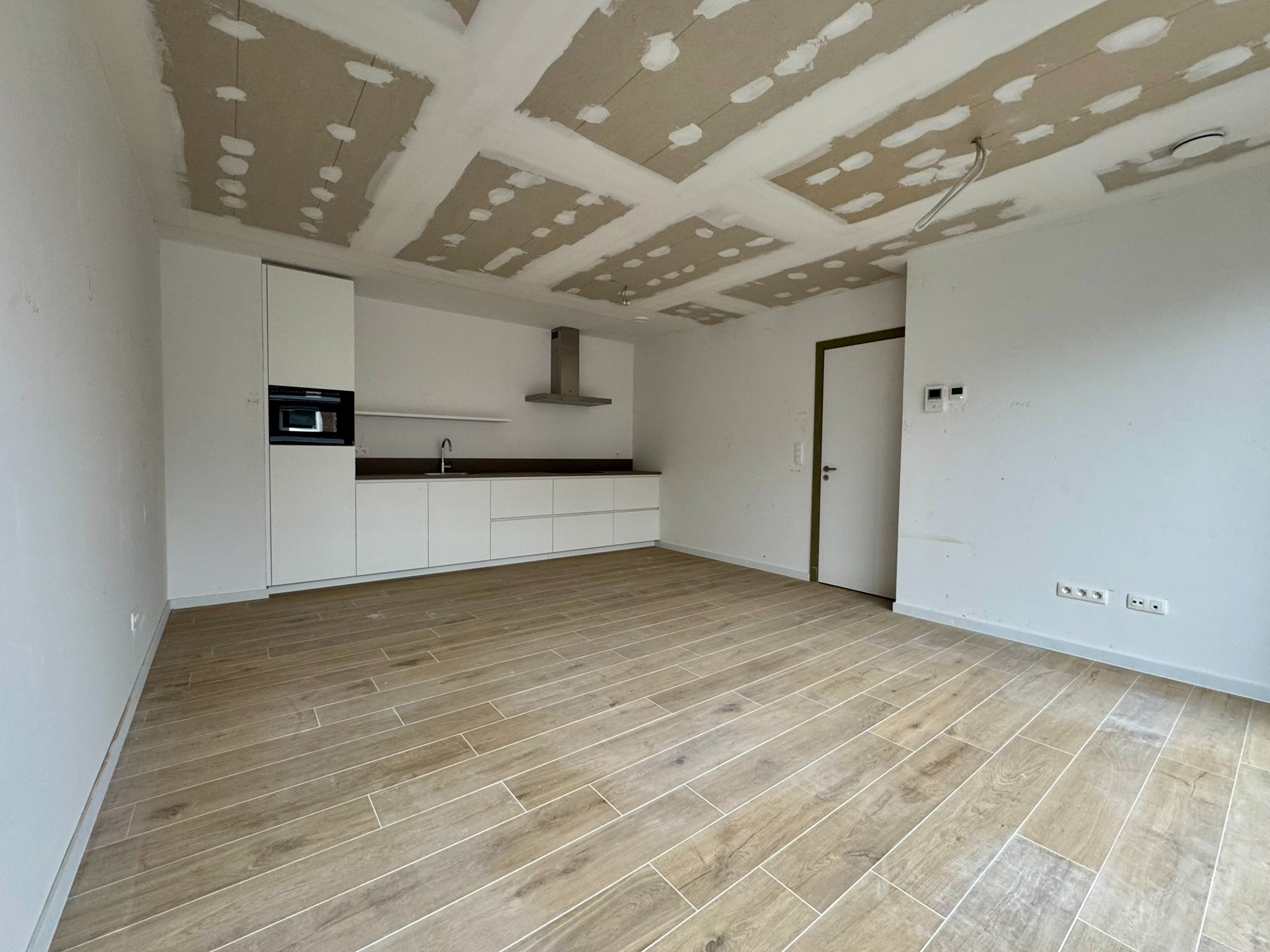 Nieuwbouwappartement (70m²) met 1 slaapkamer, staanplaats en kelderberging - foto 4