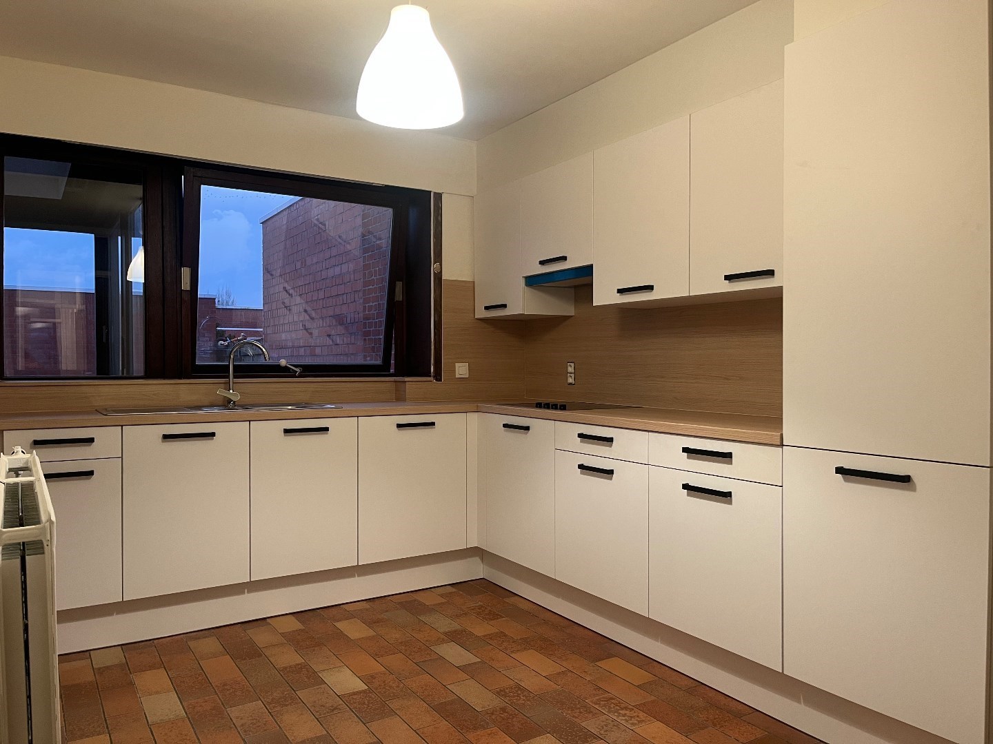 Appartement met 2 kamers, stadskoer, zijweg en kelderberging - foto 4
