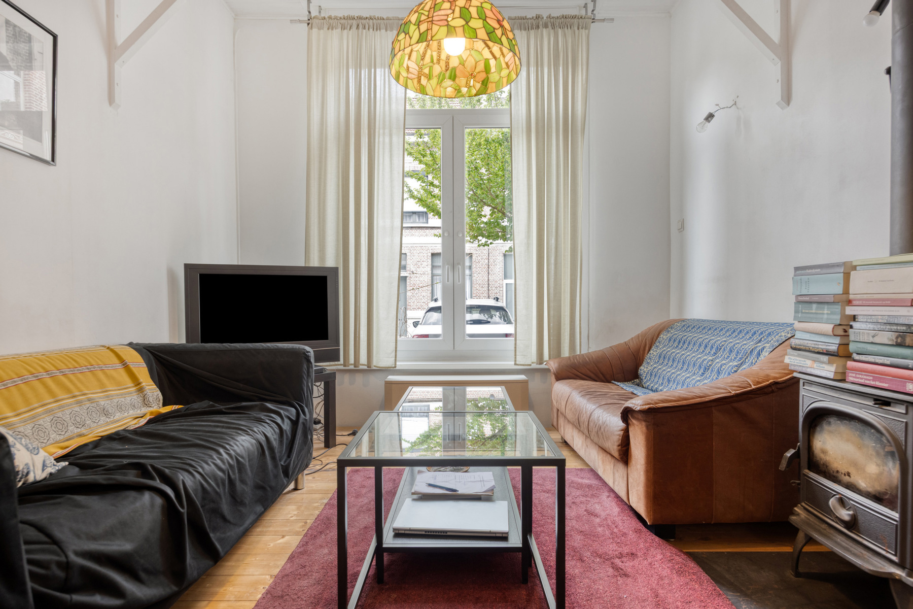 Charmante rijwoning met 3 slaapkamers in een rustige straat. - foto 4