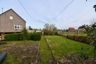 In een landelijke groene omgeving bevindt zich deze ruime alleenstaande woning boordevol potentieel. Dankzij de vele lichtpartijen geniet de...