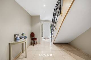 <div><div><section><div><div><div><div><div><div><p><strong>Spacious and perfectly maintained home with a practice space, double garage, and sunny garden in Veltem-Beisem</strong></p><p>Located on <strong>Hoogveldstraat</strong>, a quiet residential street in rural Veltem-Beisem (a borough of Herent), this home enjoys a pleasant living environment with excellent accessibility. The neighborhood is known for its green surroundings, spacious lots, and low-traffic streets, offering an ideal combination of tranquility and comfort.</p><p>This <strong>perfectly maintained home</strong>, built in <strong>2007</strong>, offers a well-thought-out layout with numerous possibilities for families, self-employed professionals, or anyone looking for extra space.</p><p>On the <strong>ground floor</strong>, you’ll find an <strong>indoor two-car garage</strong>, a <strong>driveway with space for an additional car</strong>, and a <strong>practice room with its own bathroom</strong>—ideal for a professional practice, a home office, or a hobby room.</p><p>The <strong>first floor</strong> forms the heart of the home. Here, you’ll enjoy a spacious and light-filled living area thanks to the large windows. The <strong>open kitchen with dining room</strong> provides direct access to the <strong>south-facing garden</strong>, where you can enjoy the sun all day long. You’ll also find a <strong>separate guest restroom</strong>, a <strong>practical pantry/storage room</strong>, and an additional <strong>bedroom or office space</strong> on this floor.</p><p>The <strong>second floor</strong> features <strong>three full-sized bedrooms</strong>, including a master bedroom with <strong>an ensuite walk-in closet and bathroom</strong>. A <strong>fixed staircase</strong> leads to the spacious <strong>attic</strong>, which is already equipped with plumbing and electrical connections for a bathroom and kitchen. This makes the space highly versatile, offering possibilities such as creating an additional living unit, a studio, or a multipurpose space.</p><p>A move-in-ready home with plenty of space, a flexible layout, and an excellent location in a quiet residential neighborhood. In short, a unique opportunity for those seeking comfortable and versatile living.</p></div></div></div></div><div> </div></div></div></section></div></div><div> </div>