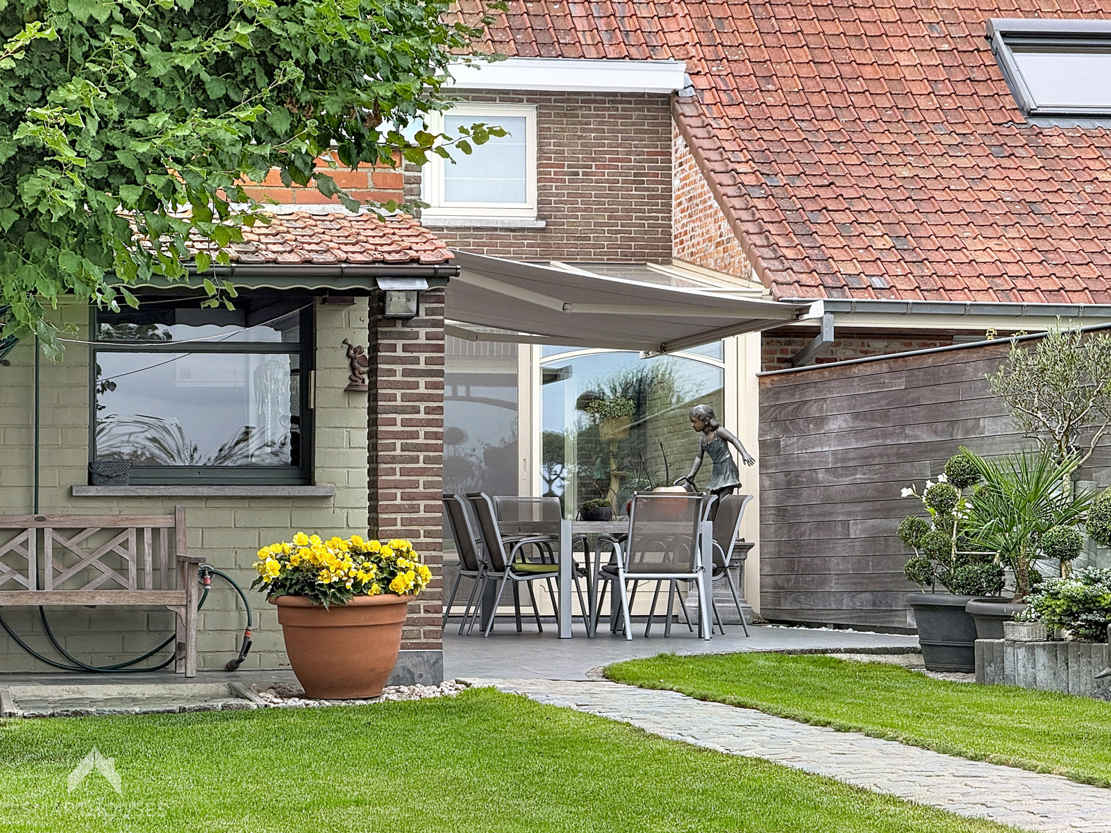 Halfopen woning met 3 slpkrs, dubbele garage en zonnige tuin - foto 5