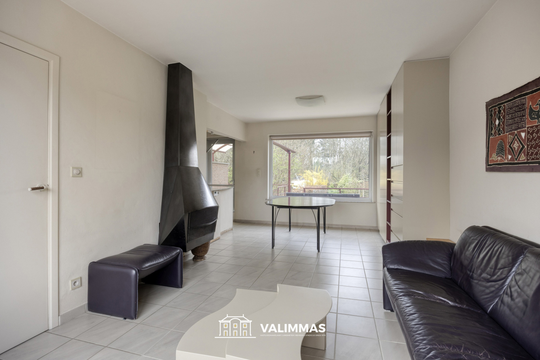 Welgelegen en verzorgde driegevelwoning met garage en tuin - foto 4