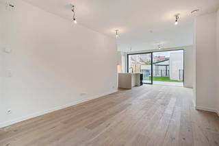 This stylish and very tastefully finished new-build home for rent is located in the Anuntiatenstraat in the center of Bruges in the quiet Saint-Gilles quarter. A few minutes' walk from the market, shops and public transport, yet quiet, which is unique in the city center.<br /><br />Layout<br />Ground floor:<br />- entrance hall with guest toilet<br />- living area with fully equipped open kitchen, finished with quality materials and appliances<br />- city garden with terrace<br />- storage space and stairs to the basement/garage<br />1st floor:<br />- bathroom 1 with bath, walk-in shower and double washbasin furniture<br />- bedroom 1<br />- bedroom 2<br />- toilet<br />- laundry and technical storage<br />2nd floor:<br />- master bedroom<br />- bathroom with walk-in shower and washbasin<br />- dressing<br />- attic room with roof window<br /><br />Advantages:<br />- comfort of a villa in the center of Bruges<br />- high quality finish<br />- parking under your own home<br />- BEN house<br /><br />Overall: <br />- Rental price: €1,750.00<br />- Available from: 01/09/2026<br /><br />