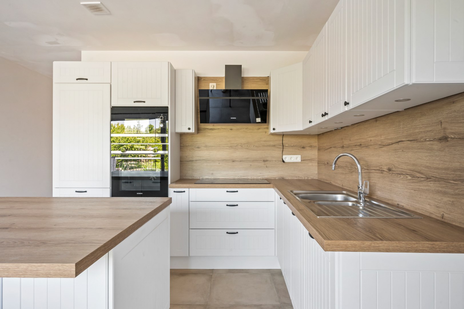 NIEUWBOUWAPPARTEMENT MET EPC A, 3 SLPKS EN 2 ZONGERICHTE TERRASSEN - foto 2