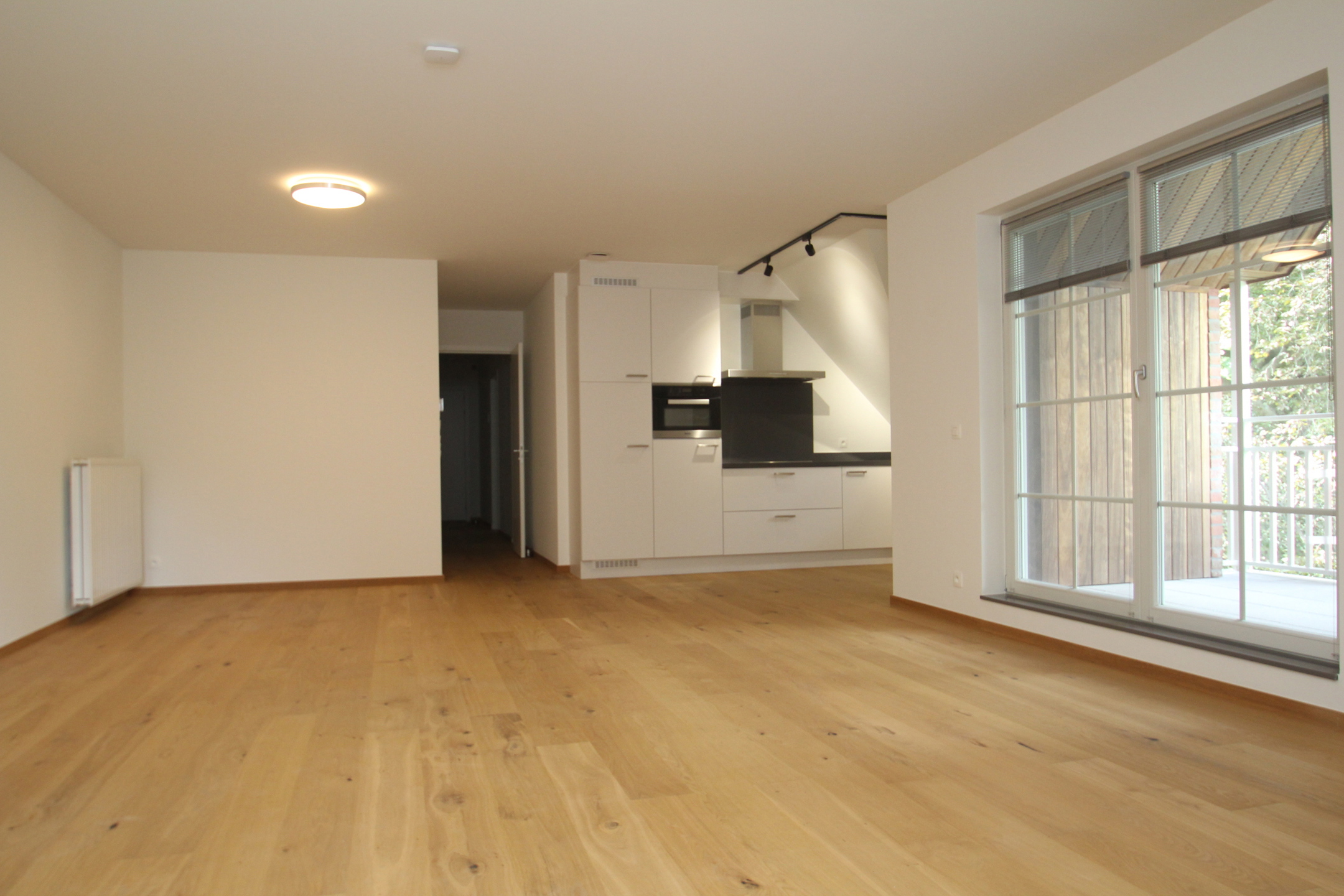 Instapklaar dakappartement met lift, 2 slaap- en badkamers én inpand. parking - foto 3