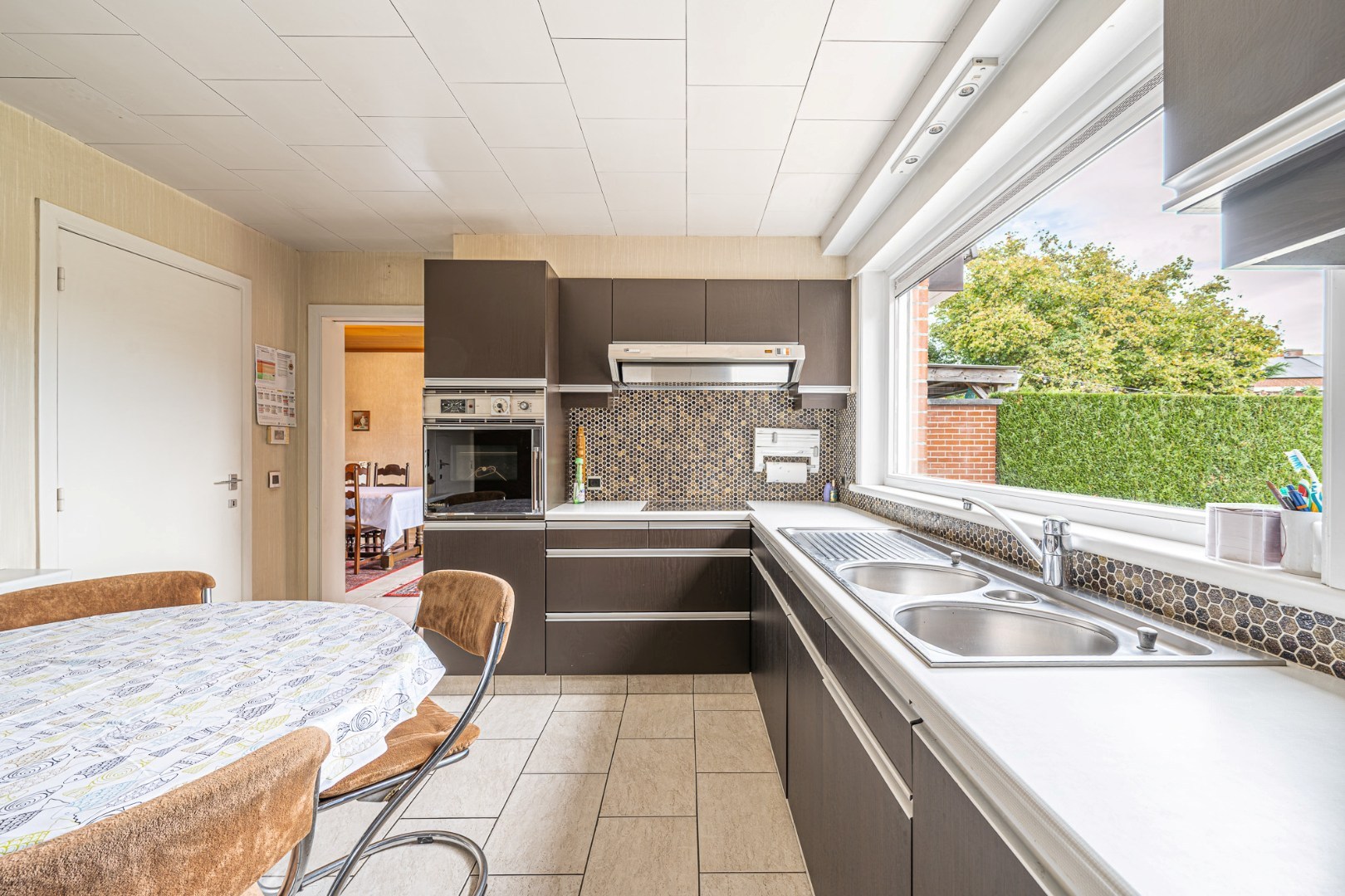 Ruime woning met 3 slaapkamers, garage en zonnige tuin in Geluwe - foto 5