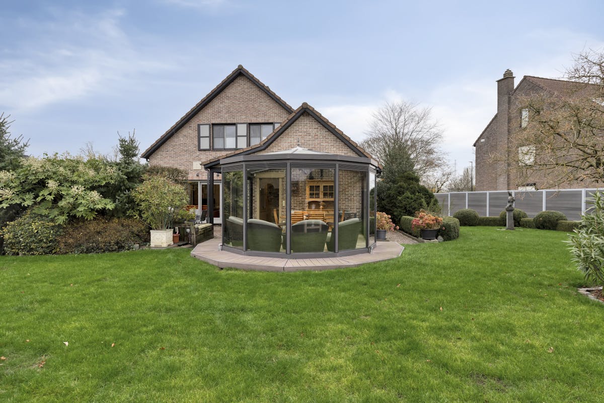 Mooie villa met schitterende tuin in residentiële woonwijk - foto 4